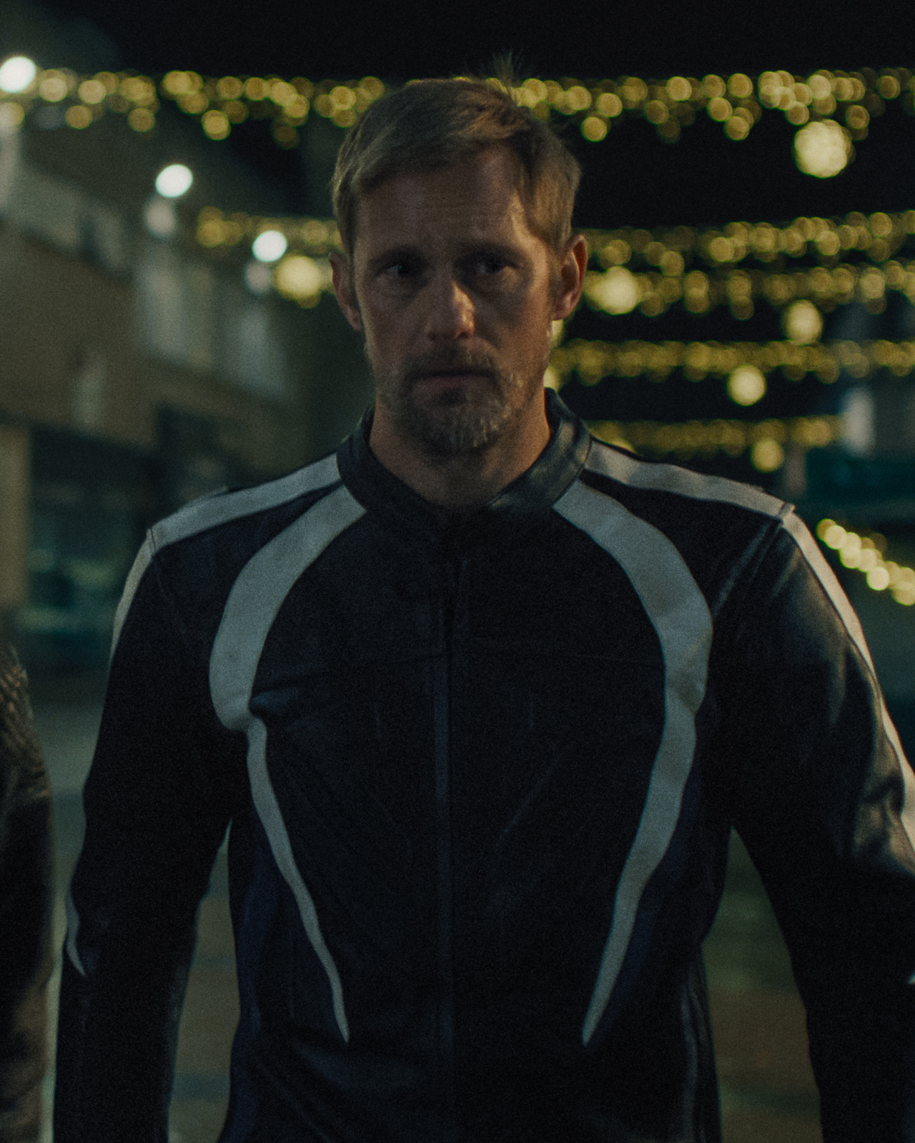 Two characters from Pillion at night